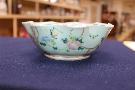 A Chinese celadon glazed dish, a Jun type tripod dish and a famille rose bowl and cover